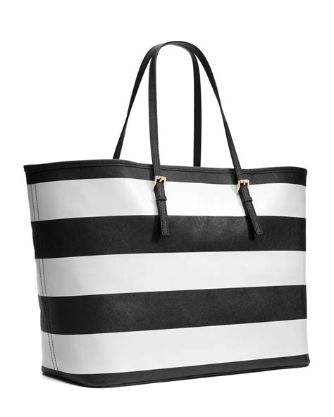 michael kors black white striped jet set tote|Michael Kors jet set luggage.